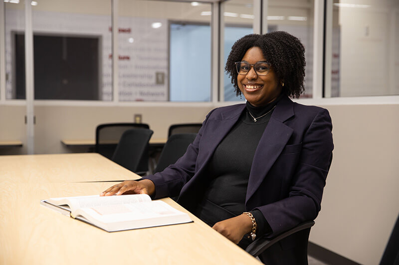 UWG Richards College of Business student sitting at table