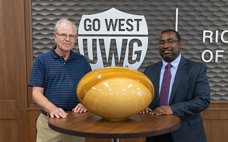 Moulthrop and Dr. Christopher Johnson with the finished bowl