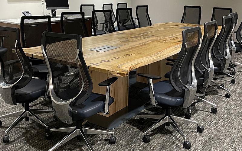 Some trees were repurposed, like this conference table.