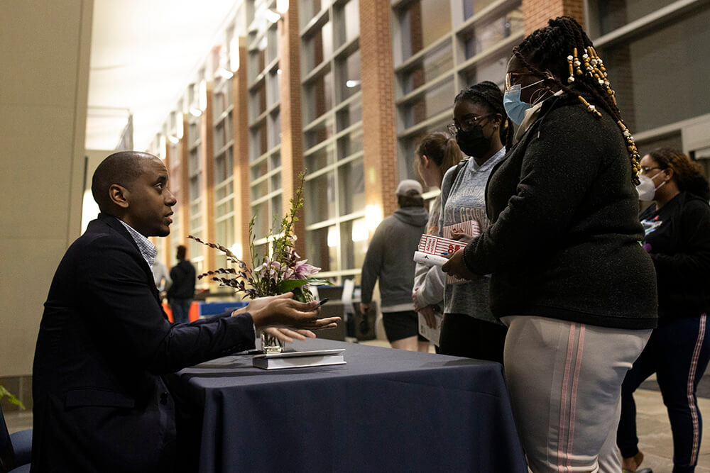 Walker held a book signing after the lecture.