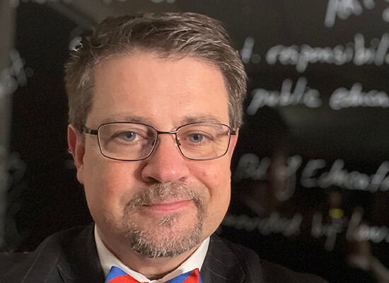 Mike L. Dishman, J.D., Ed.D.