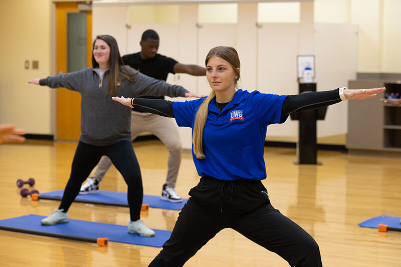 students doing yoga