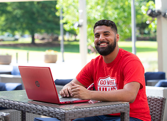 Student working on a laptop