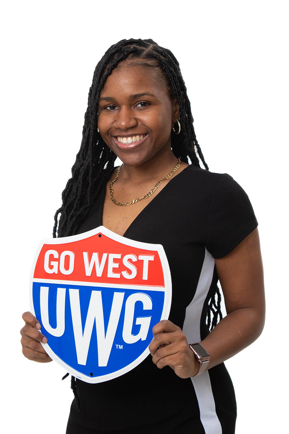Sydney Francis holding a UWG shield sign