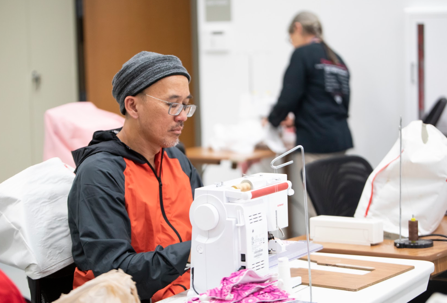 Alan Yeong-Marcello and Nan Stephens creating COVID-19 masks.