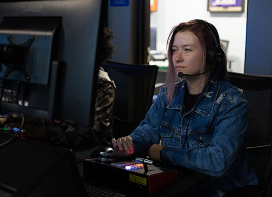 Student sitting in a control room