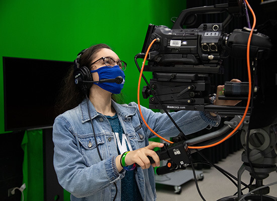 Student at a video camera