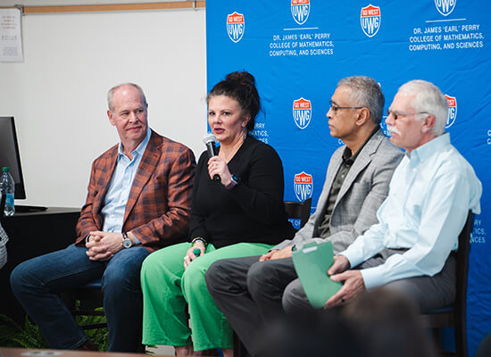 L to R: Rusty West ’88, Dr. Allison Key ’02, Sid Mookerji, Dr. Ted Grosch