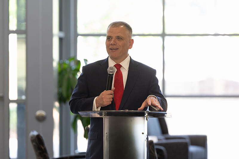 UWG president Dr. Michael Johnson speaking to an audience