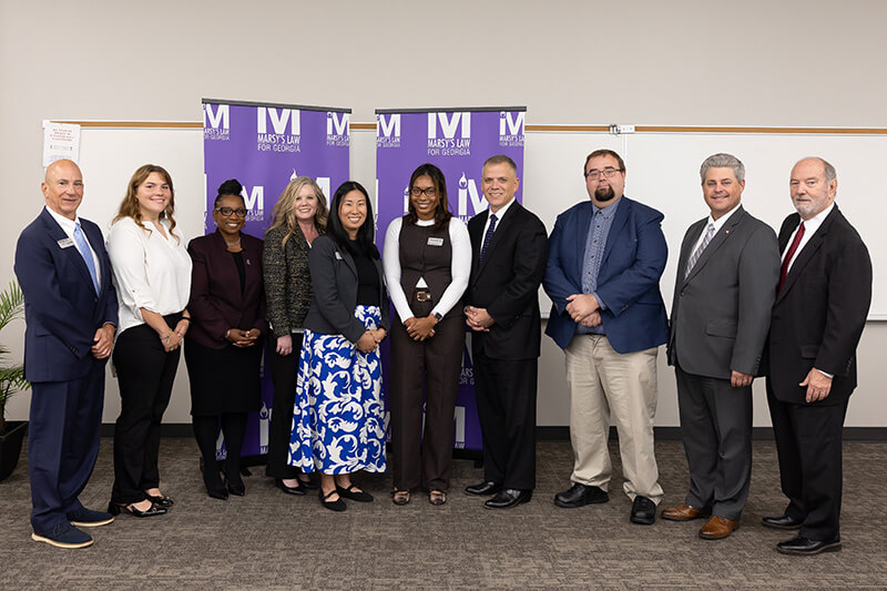 L to R: Pete Skandalakis, PAC executive director; Devon Munoz, UWG student; Dr. Rita Davis-Cannon, PAC victim assistance division director, Marsy’s Law for Georgia advisory board member and certification program co-creator; Dr. Karen Owen, dean of UWG’s University College; Dr. Mai Naito Mills, associate professor, UWG; Brittani McNeal, former UWG professor; Dr. Michael Johnson, UWG president; Dr. Anthony Fleming, associate professor, UWG; Todd Hayes, Cherokee County solicitor general and chair of PAC’s Victim Services Committee; Mel Hewitt, advisory board member, Marsy’s Law for Georgia