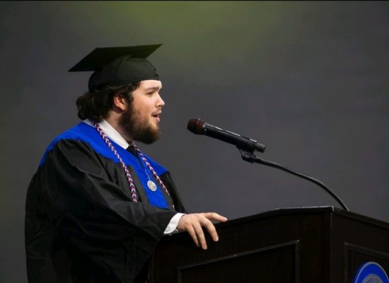 Chase Williams at UWG Commencement as SGA president