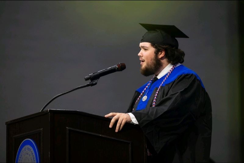 Chase Williams at UWG Commencement as SGA president.
