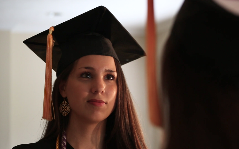 nursing student wearing a cap and ready for graduation