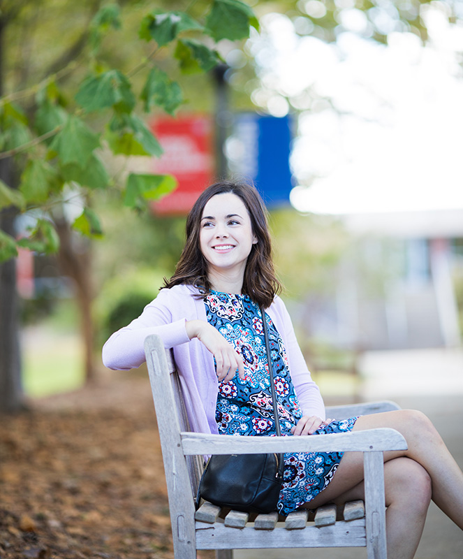 student sitting on campus