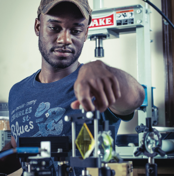 Student working in the physics lab.