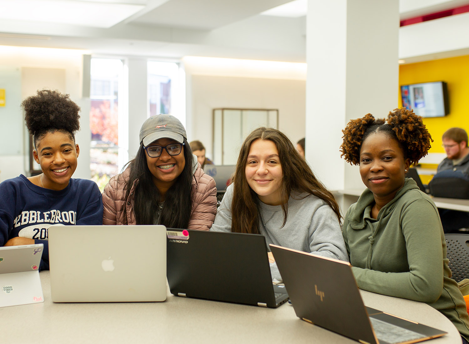 students working on laptops in the Ingram Library