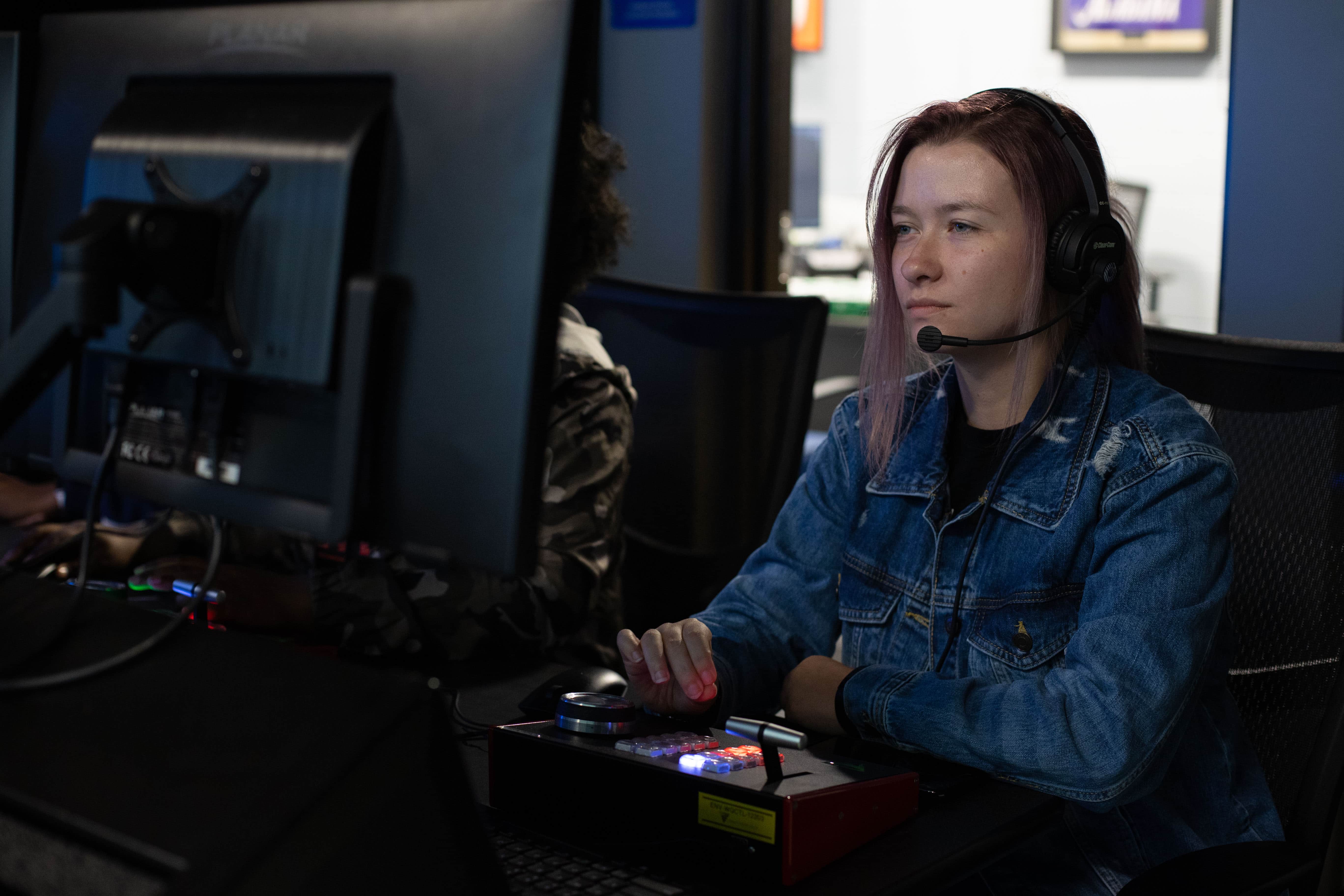 Productions student working on the replay machine.