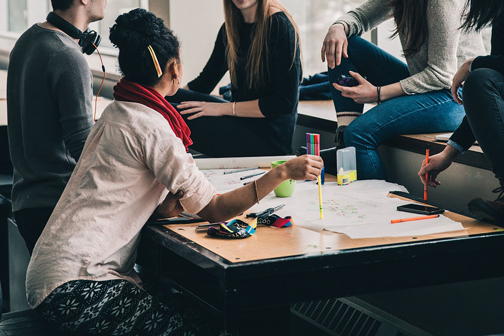 students sitting around a table