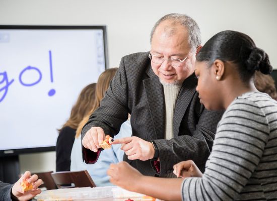 Student and Instructor in a classroom setting