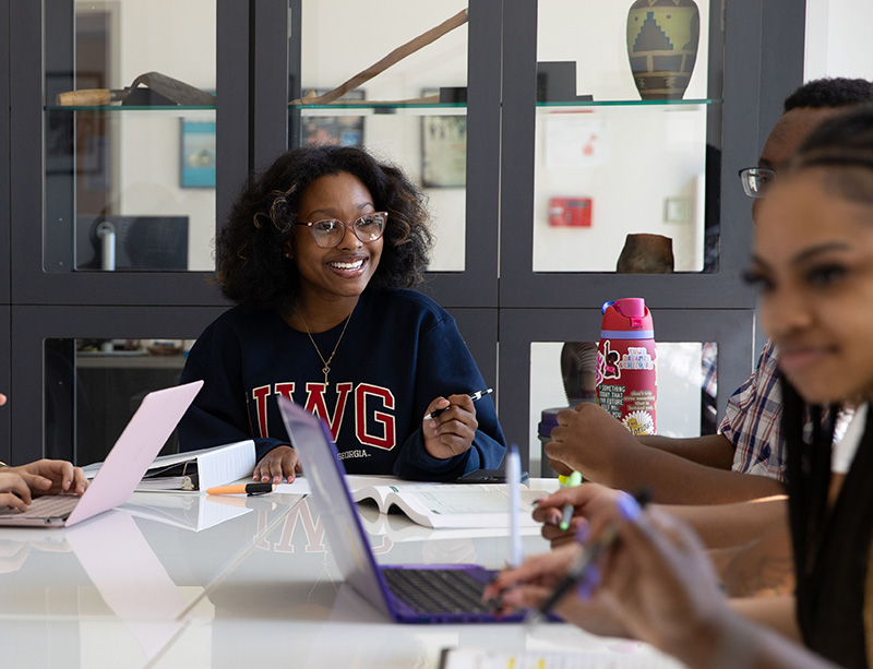 female student at a seminar table