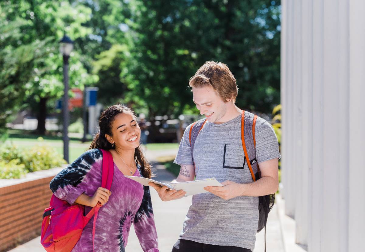 Two students talking outside