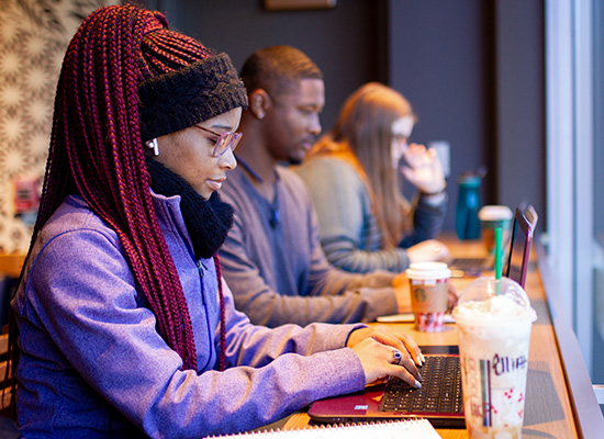 students sitting in Starbucks