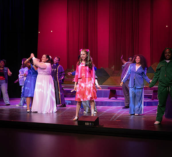 female performers on stage of Freaky Friday production