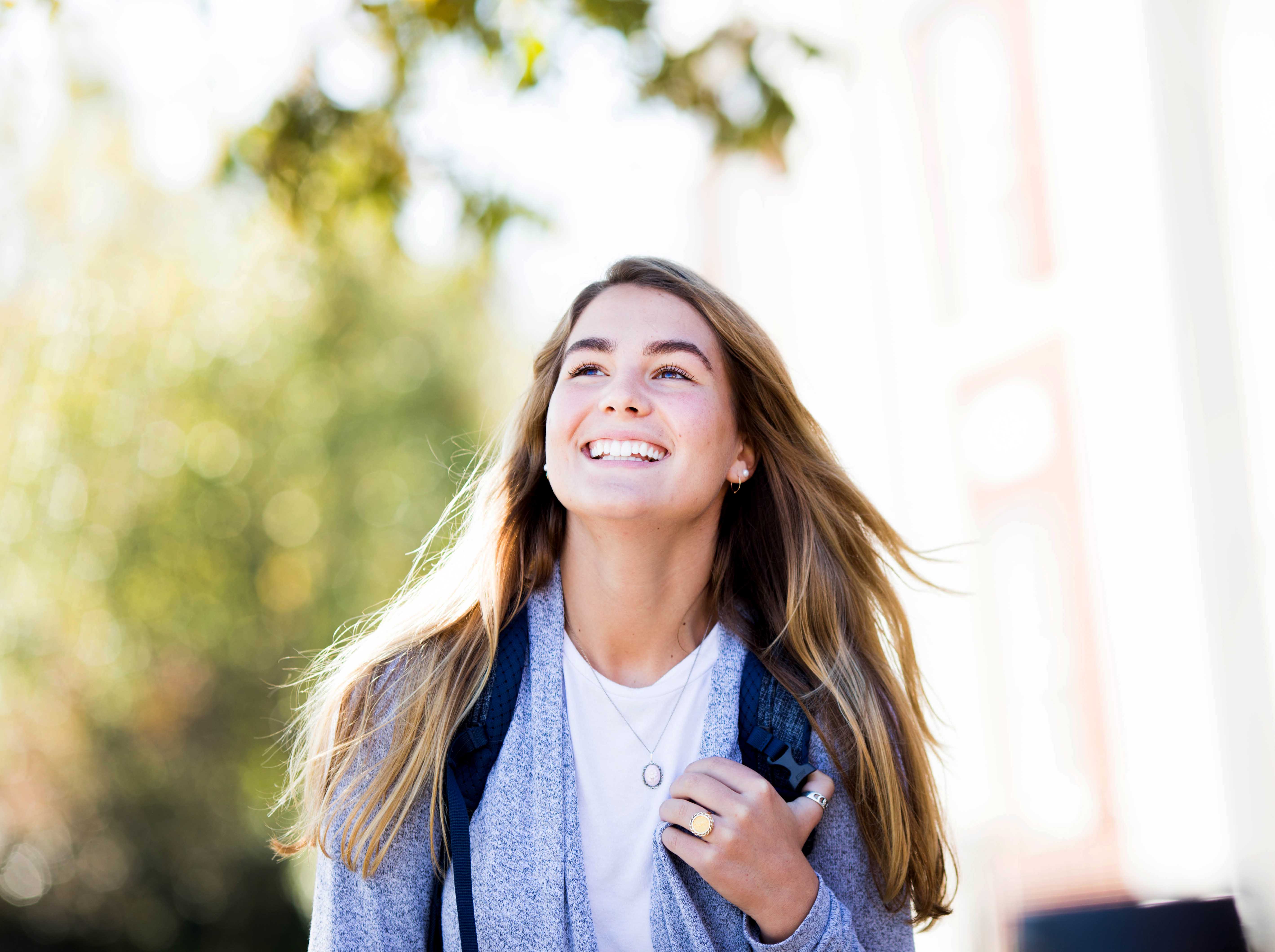 A female student walking outside