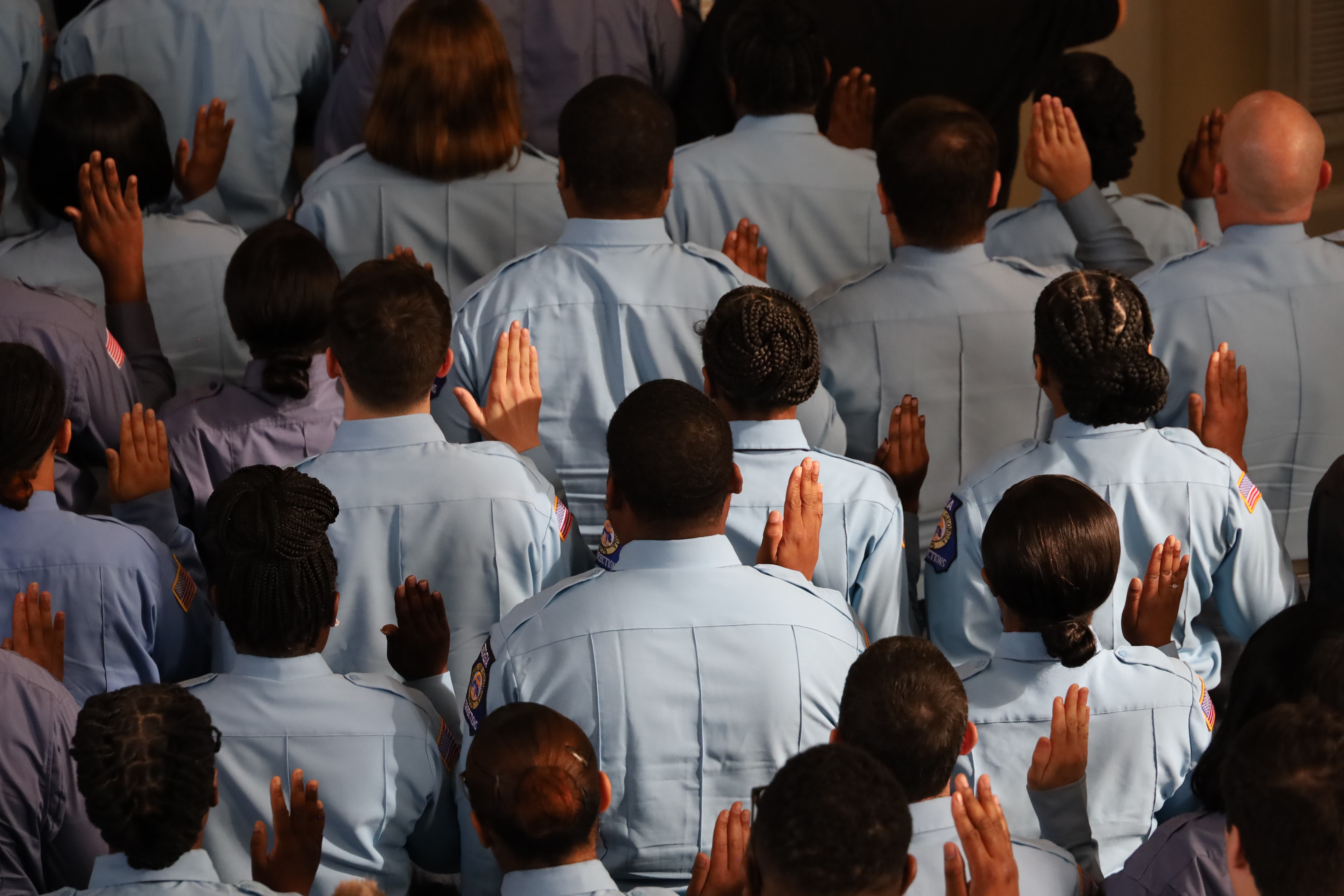 Group of GDC cadets being sworn in.