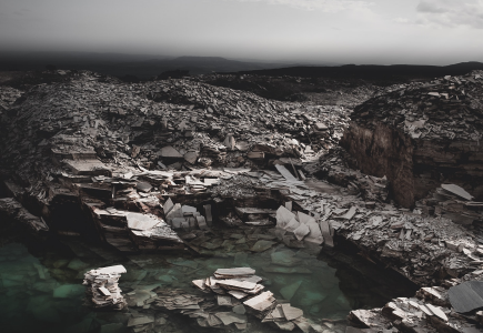 A grave yard of slate rock that use to be a natural mound