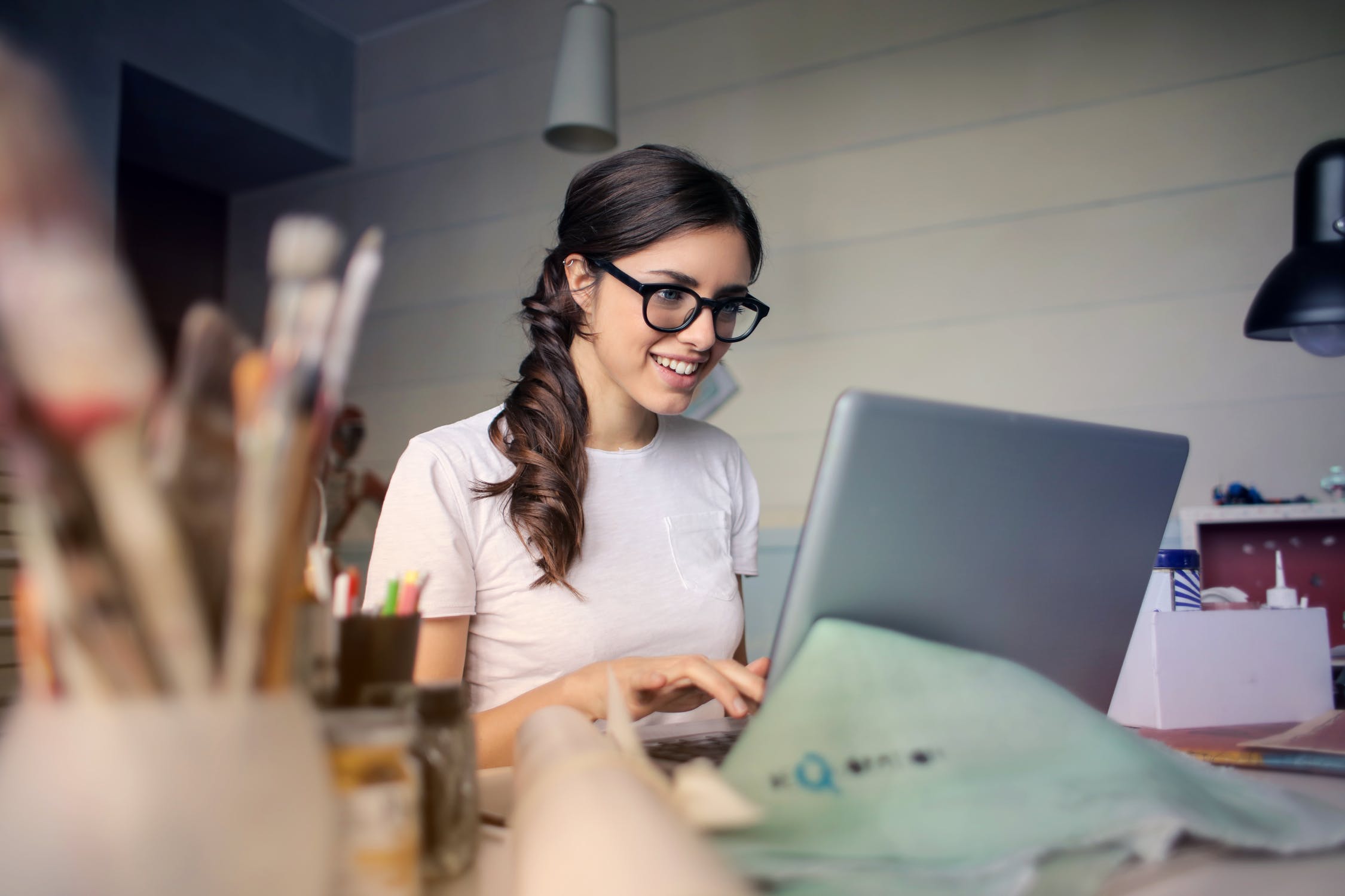 girl typing on a computer