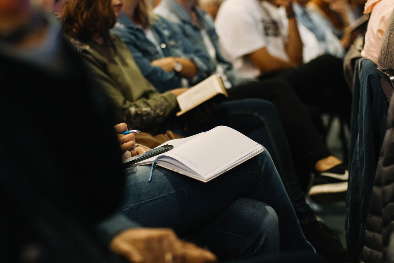 People sitting listening to a presentation