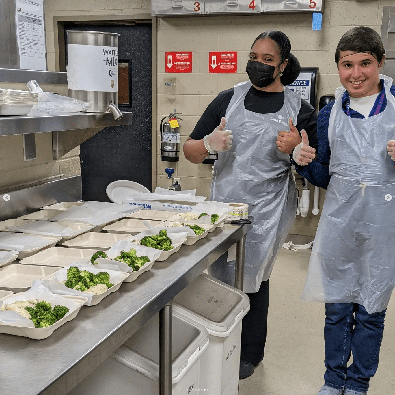 Wolves Dont Waste students preparing food.