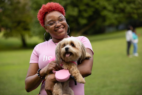 student with pet