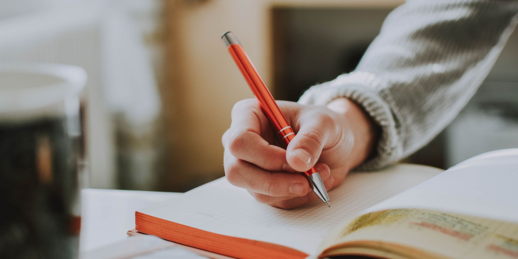 student taking notes