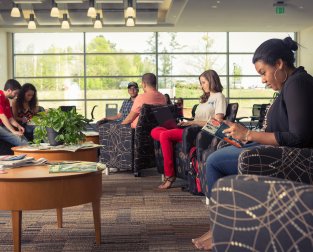 People reading in a lobby