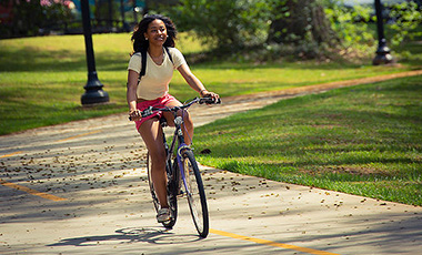According to Brendan Bowen, assistant vice president of Campus Planning & Facilities, CP&F has actively partnered with Parking and Transportation Services, community stakeholders, and design experts to develop a safe and efficient infrastructure for biking on campus under UWG President Kyle Marrero's leadership.