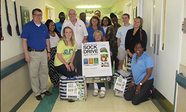 The University of West Georgia’s Center for Diversity and Inclusion (CDI) recently held its fifth annual sock drive in celebration of Older Americans Month. Students, alumni, and CDI staff delivered a total of 813 socks to four nursing homes in Carrollton—Carrollton Manor, Carrollton Nursing and Rehabilitation, the Oaks of Carrollton, and Pine Knoll Nursing and Rehabilitation—and Haralson Nursing and Rehabilitation in Haralson County.