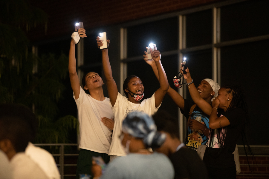 students taking selfies 