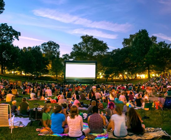 Students watching a movie on the quad